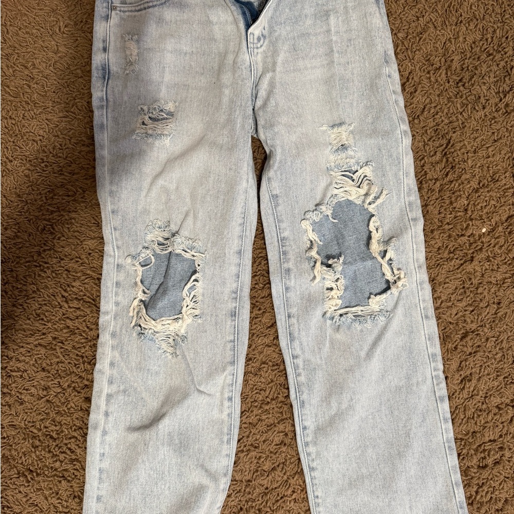 Women's Distressed Light Blue Jeans